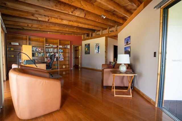 2741 Edwards Rd, Haines City, FL 33844 - living room with wood finished floors, a wood ceiling with exposed beams, and a desk