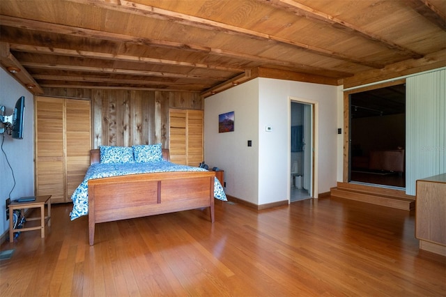 2741 Edwards Rd, Haines City, FL 33844 - bedroom with wood finished floors, a wood ceiling with exposed beams, and wood walls