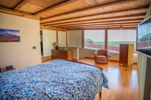 2741 Edwards Rd, Haines City, FL 33844 - bedroom featuring hardwood / wood-style floors and a wooden ceiling with exposed beams