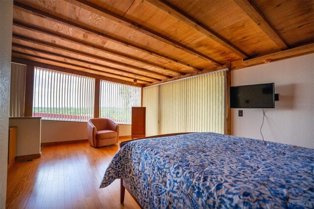 2741 Edwards Rd, Haines City, FL 33844 - bedroom featuring hardwood / wood-style floors and a wood ceiling with exposed beams