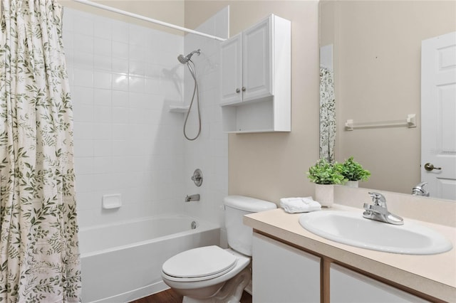 bathroom featuring toilet, vanity, and shower / bath combination with curtain
