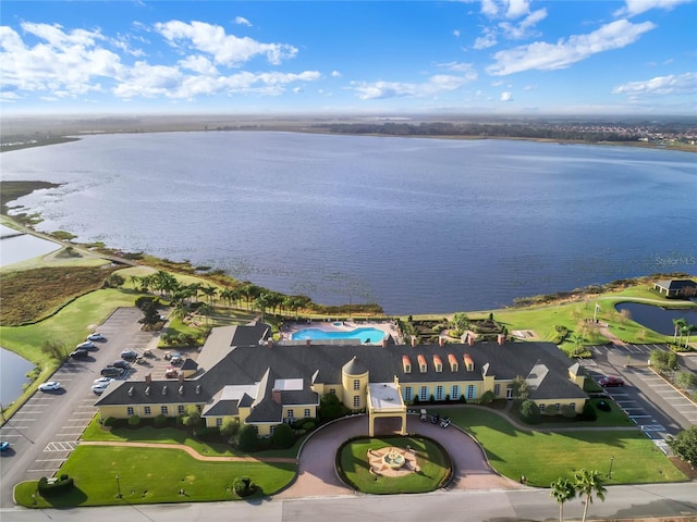 drone / aerial view with a water view