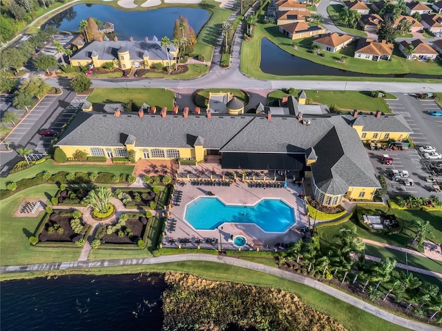bird's eye view with a residential view and a water view