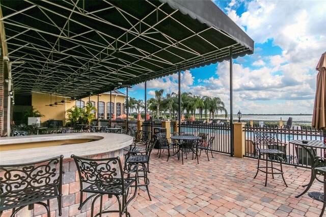 view of patio featuring a water view