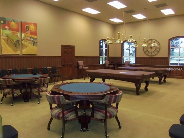 playroom featuring pool table, a high ceiling, carpet floors, and wainscoting