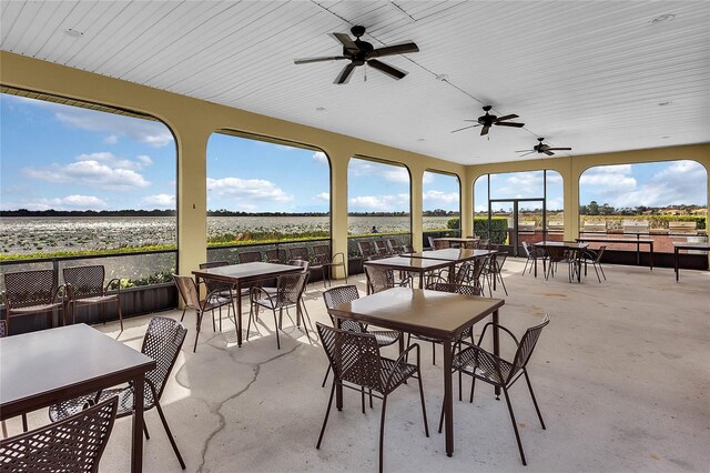 view of patio featuring ceiling fan