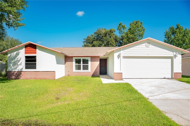 single story home with a garage and a front yard