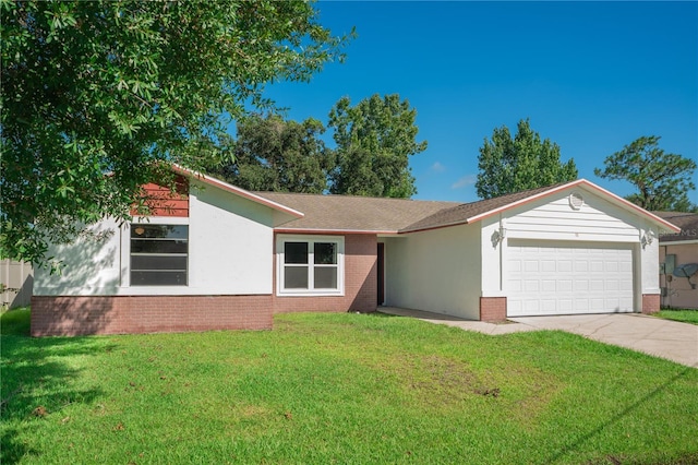 ranch-style home with a garage and a front yard