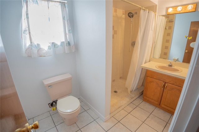 bathroom featuring toilet, a shower with curtain, tile patterned flooring, and vanity