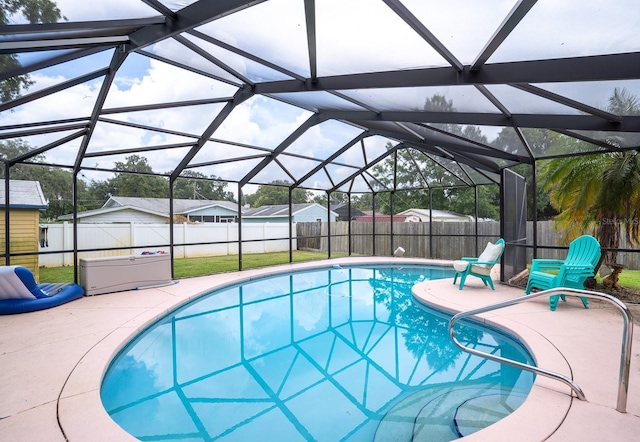 view of swimming pool with a patio area, a fenced backyard, and a fenced in pool