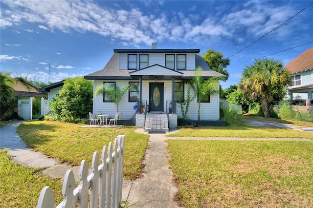 view of front of house with a front lawn