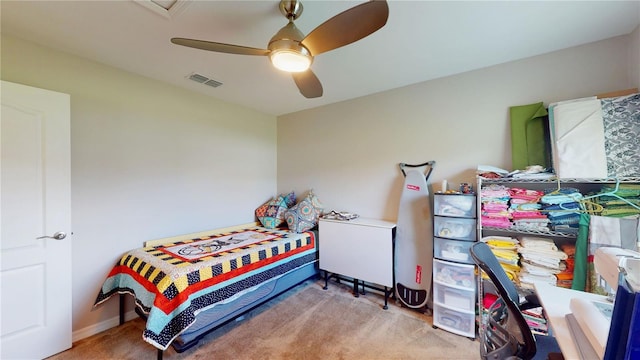 carpeted bedroom featuring ceiling fan