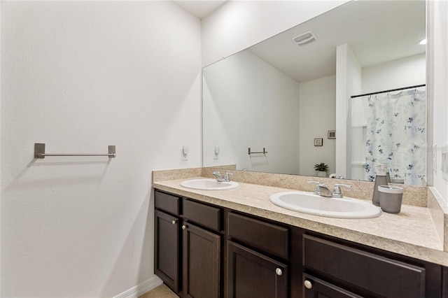 bathroom with double vanity