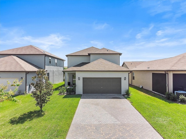9681 Flourish Dr, Land O Lakes, FL 34637 - ranch-style house with decorative driveway, stucco siding, a front lawn, a garage, and cooling unit
