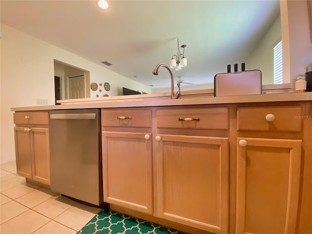 kitchen with sink, an inviting chandelier, stainless steel dishwasher, light brown cabinets, and light tile patterned floors