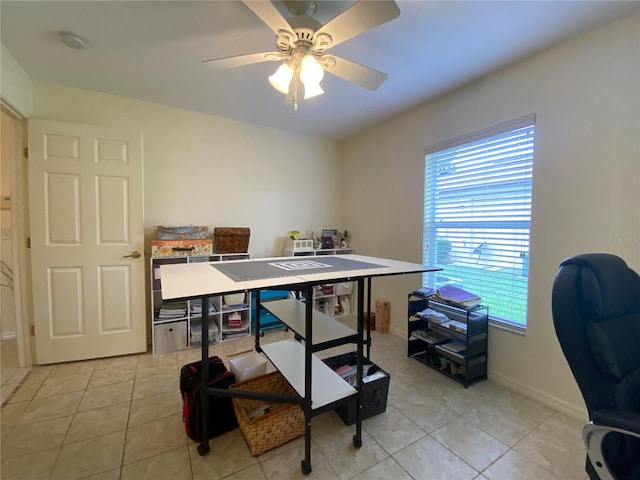 tiled office space with a wealth of natural light and ceiling fan