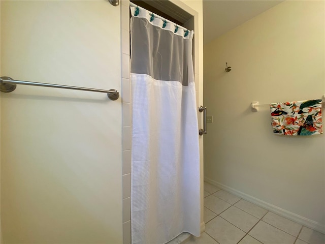 bathroom with tile patterned flooring