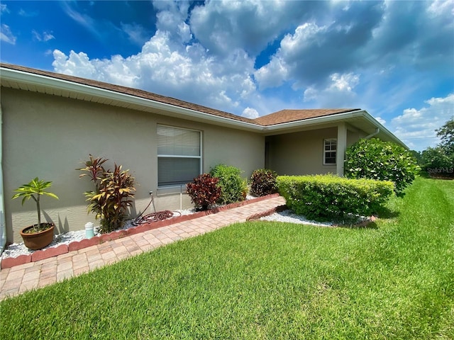 exterior space featuring a lawn