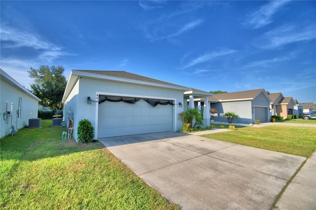 ranch-style house featuring cooling unit, a garage, and a front yard