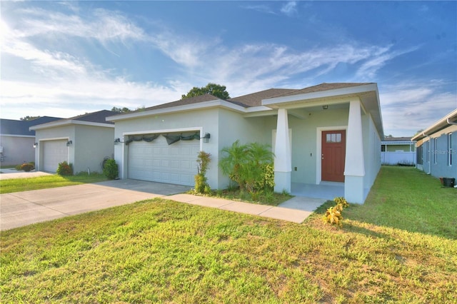 view of front of house with a front lawn and a garage