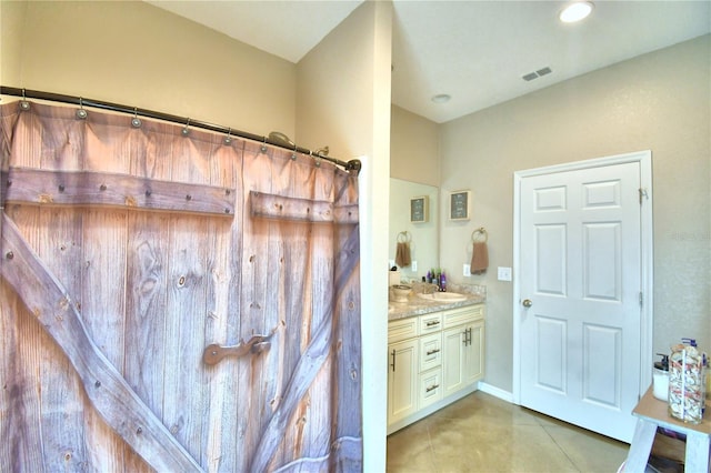 bathroom featuring vanity and tile patterned floors