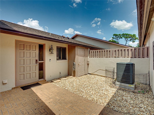 view of patio with central AC unit