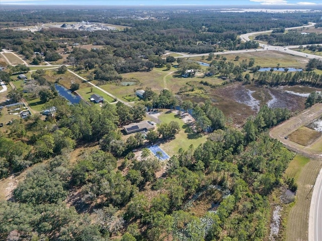 222 Rod Ln, Davenport, FL 33837 - aerial view of property and surrounding area with a nearby body of water and a forest
