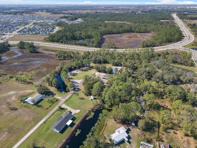 222 Rod Ln, Davenport, FL 33837 - aerial view of property's location with a heavily wooded area