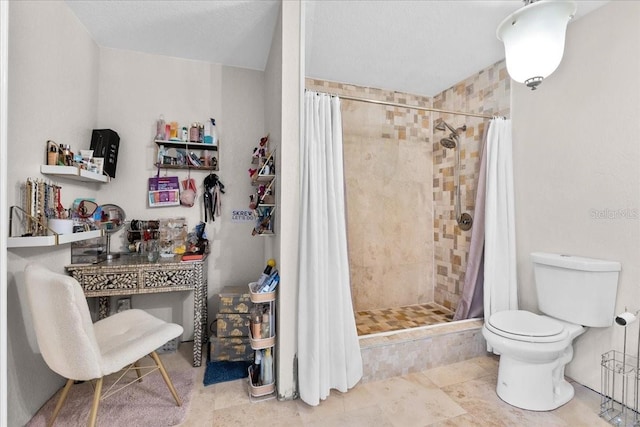 bathroom with a shower with curtain and toilet