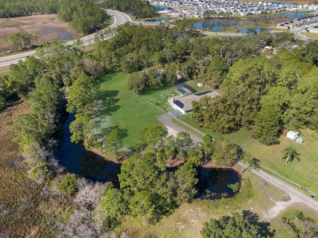 drone / aerial view featuring a water view