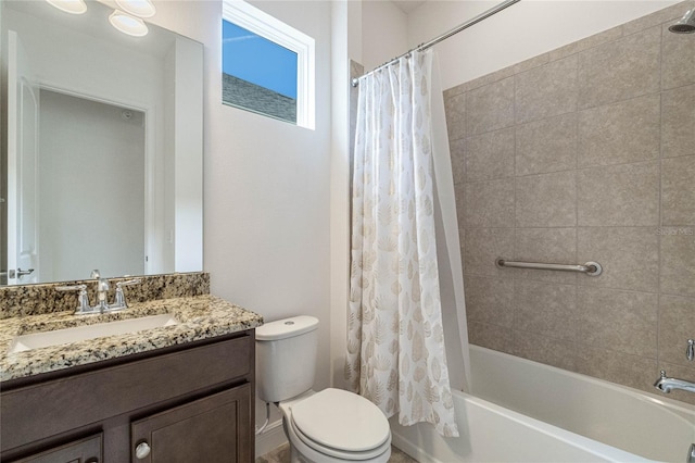 full bathroom featuring toilet, shower / tub combo, and vanity