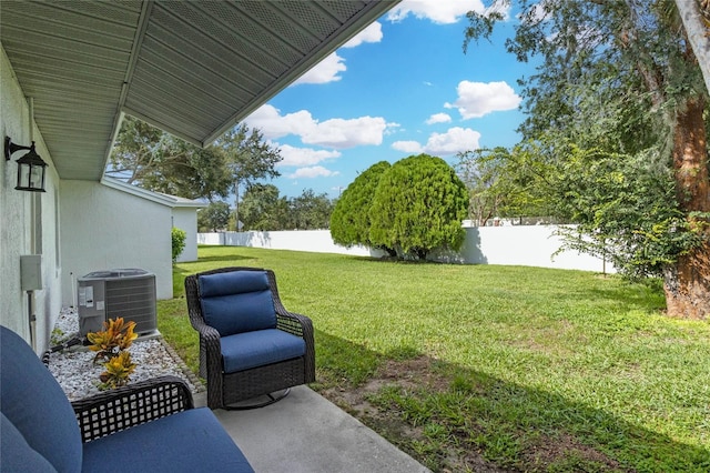 view of yard featuring central AC