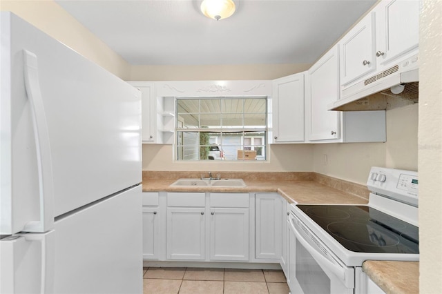 kitchen featuring white cabinets, white appliances, under cabinet range hood, and light countertops