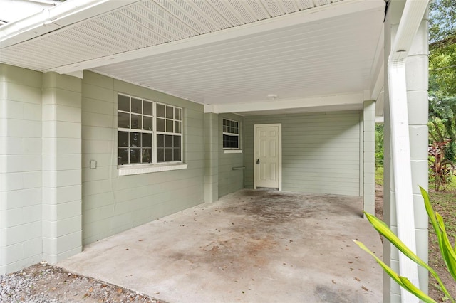 view of patio featuring a carport