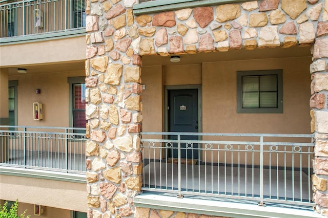 doorway to property with a balcony