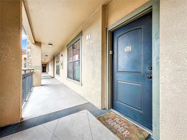 902 Charo Pkwy Unit 624, Davenport, FL 33897 - property entrance with stucco siding