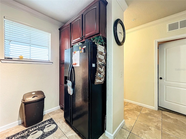 902 Charo Pkwy Unit 624, Davenport, FL 33897 - kitchen featuring black fridge with ice dispenser, light tile patterned floors, dark brown cabinets, and crown molding