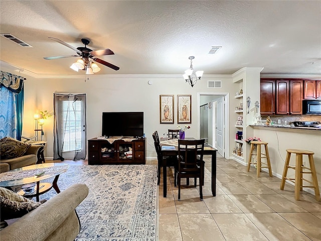 902 Charo Pkwy Unit 624, Davenport, FL 33897 - living area with ornamental molding, ceiling fan, light tile patterned floors, a chandelier, and a textured ceiling