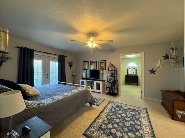 bedroom with light carpet, access to outside, french doors, ceiling fan, and a textured ceiling