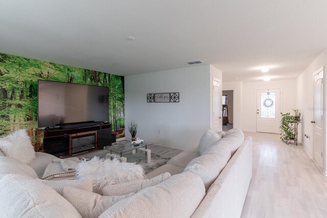 living room with light hardwood / wood-style floors