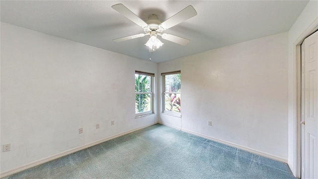 unfurnished bedroom with carpet floors and ceiling fan