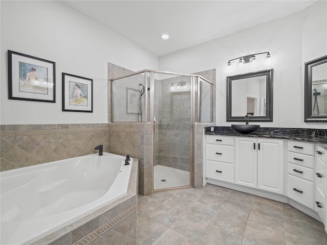 bathroom with vanity and plus walk in shower