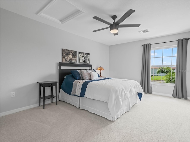 carpeted bedroom featuring ceiling fan