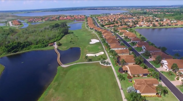 drone / aerial view with a water view