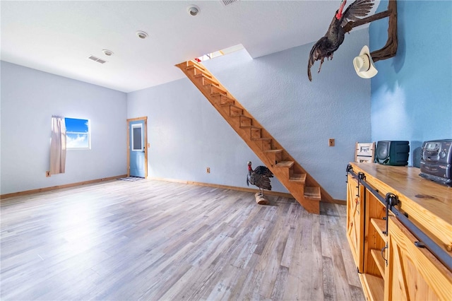 interior space with hardwood / wood-style floors