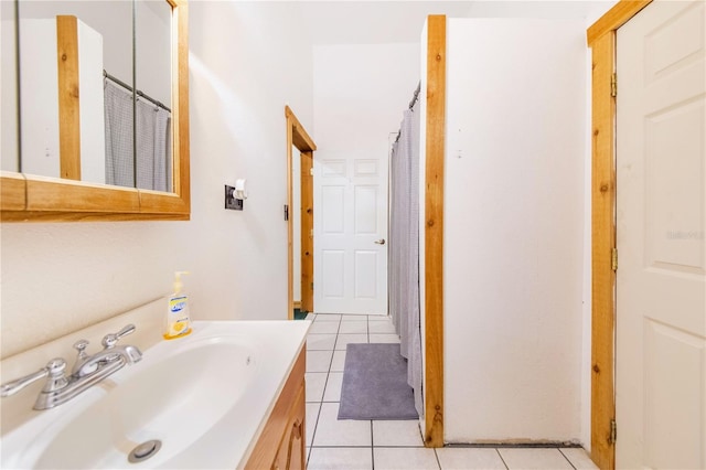 bathroom featuring tile patterned floors and vanity