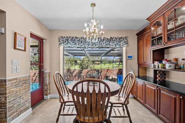 dining area featuring a chandelier