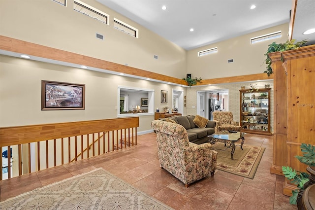 interior space with a towering ceiling