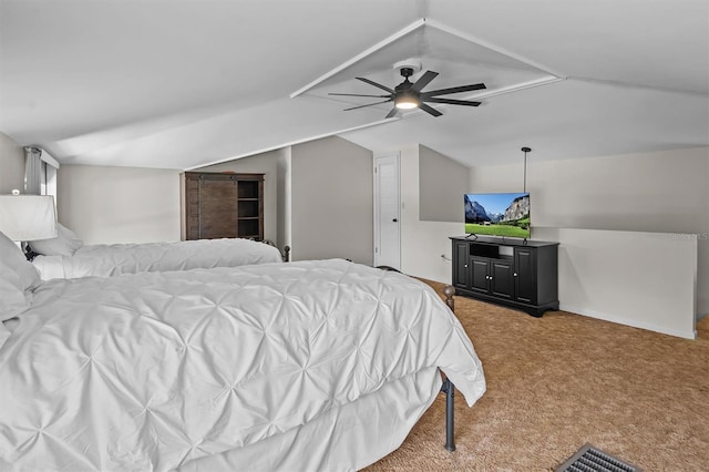 carpeted bedroom featuring lofted ceiling and ceiling fan