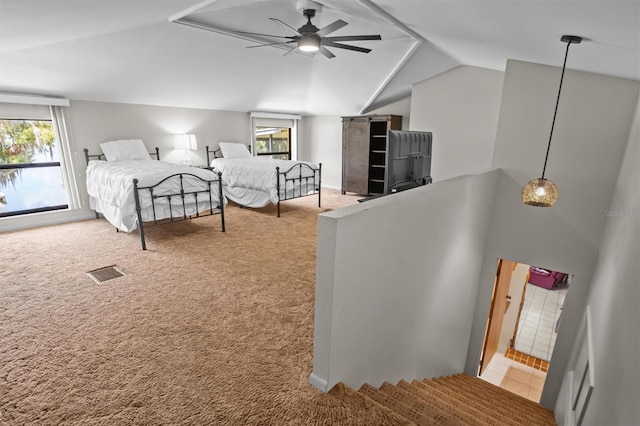 carpeted bedroom with high vaulted ceiling, multiple windows, and ceiling fan